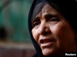 The mother of Youssef Abdullah, one of at least 22 Egyptians found dead earlier this month in the Libyan desert, speaks in the village of Tarfa al-Kom in Minya province, Egypt, July 12, 2017.