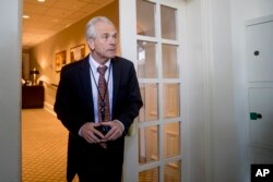 White House trade adviser Peter Navarro arrives for a news conference between President Donald Trump and Japanese Prime Minister Shinzo Abe in the Rose Garden at the White House, June 7, 2018, in Washington.