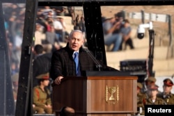 FILE - Israeli Prime Minister Benjamin Netanyahu speaks at the Israeli Air Force pilots' graduation ceremony at Hatzerim air base in southern Israel, Dec. 26, 2018.