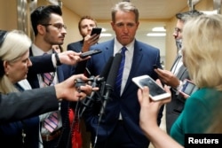 U.S. Senator Jeff Flake (R-AZ) speaks with news media at the U.S. Capitol building in Washington, U.S., July 16, 2018.