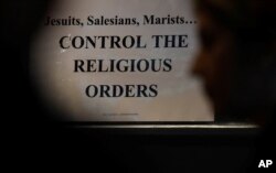 People attend a news conference by the protest group Ending Clergy Abuse ahead of a two day visit by Pope Francis in Dublin, Ireland, Aug. 24, 2018.