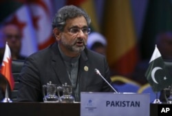 FILE - Pakistan's Prime Minister Shahid Khaqan Abbasi addresses the Organisation of Islamic Cooperation's Extraordinary Summit in Istanbul, Dec. 13, 2017.