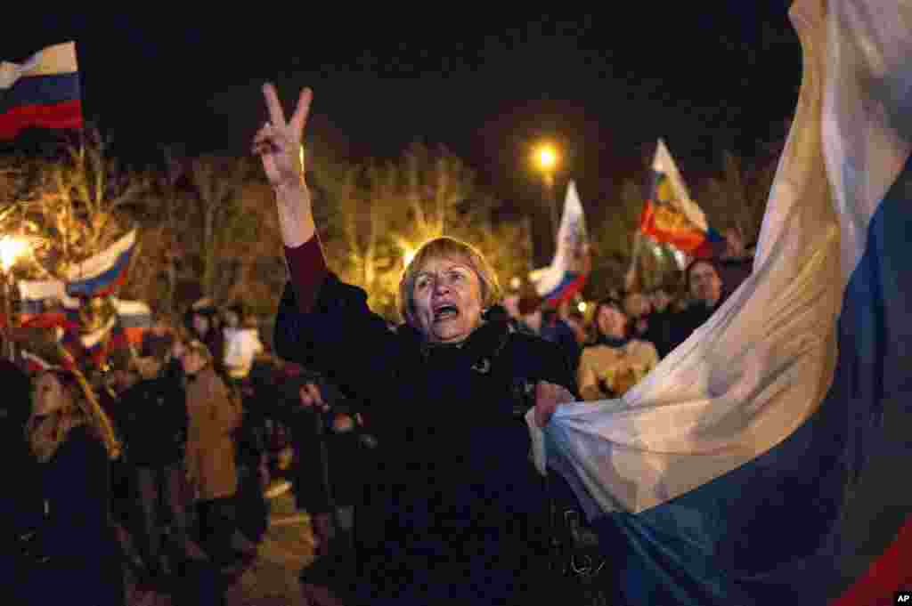 A pro-Russian crowd celebrates in the central square in Sevastopol, Ukraine, March 16, 2014.