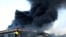 A factory burns on the outskirts of Durban, South Africa, July 14, 2021. Former president Jacob Zuma's incarceration for contempt of court, sparked off the worst violence South Africa has seen since the nation achieved democracy in 1994.