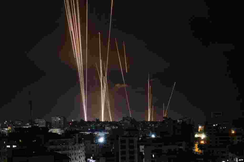 A salvo of rockets is fired by Palestinian militants from Gaza City toward Israel, Oct. 7, 2023.&nbsp;At least 70 people were reported killed in Israel, while Gaza authorities released a death toll of 198 in the bloodiest escalation in the wider conflict since May 2021, with hundreds more wounded on both sides.