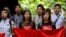 Myanmar students participate in a ceremony marking the 53rd anniversary of a 1962 student uprising at Yangon University, Myanmar, July 7, 2015