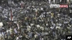 叙利亚民众在拉斯坦城举行抗议示威 要求阿萨德总统下台