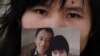 Wife of Chinese Dissident Sees Husband Before Release