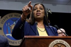 FILE - New York State Attorney General Letitia James speaks during a news conference at her office in New York, Nov. 19, 2019.