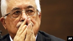 Palestinian President Mahmoud Abbas listens to a question during a news conference in the capital Sarajevo, Bosnia-Herzegovina, August 16, 2011