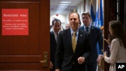 House Intelligence Committee Chairman Adam Schiff, D-Calif., leaves a secure area at the Capitol to speak to reporters, in Washington, Oct. 28, 2019.