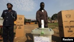 A man votes at a polling station in Kibi, in eastern Ghana and stronghold of opposition presidential candidate Nana Akufo-Addo on Dec. 7, 2012. 