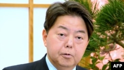 FILE - Japanese Foreign Minister Yoshimasa Hayashi answers questions during a press conference in Tokyo, Jan. 6, 2022.