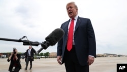 U.S. President Donald Trump speaks to reporters before boarding Air Force One for travel to Indianapolis, Indiana, at Joint Base Andrews, Maryland, outside Washington, D.C, April 26, 2019. 