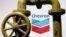 FILE - The Chevron logo is featured in this illustration photo created on Oct. 23, 2023. 