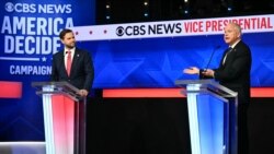 ທ່ານ ແວນສ໌ ແລະ ທ່ານ ວອລຊ໌ ປະເຊີນໜ້າກັນ ຢູ່ທີ່ການໂຕ້ວາທີຮອງປະທານາທິບໍດີສະຫ