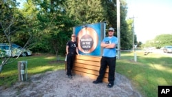 FILE - This photo provided by Hannah Albert on Sept. 23, 2020 shows Steve Klatt, left, and Brandon Lapp, owners of Braised in the South, a Johns Island, S.C, restaurant and food truck business that is having trouble finding workers during the pandemic. 