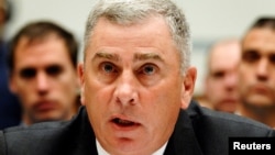 FILE: Retired U.S. Army Gen. John Abizaid testifies during a House Oversight and Government Reform Committee hearing on what military leaders knew about the death in Afghanistan of Army Ranger and ex-football star Pat Tillman, Aug. 1, 2007. 