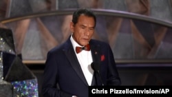 FILE - Wes Studi introduces a tribute to films that honor service in the military at the Oscars, March 4, 2018, at the Dolby Theatre in Los Angeles.