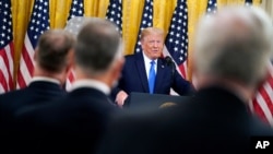 President Donald Trump speaks during an event to honor Bay of Pigs veterans, in the East Room of the White House, Sept. 23, 2020.