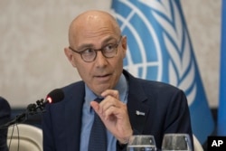 FILE - U.N. High Commissioner for Human Rights Volker Turk, shown here speaking at a press conference in Baghdad, Iraq, on Aug. 9, 2023, said on Oct. 27 that Israel's "collective punishment" of Palestinians living in Gaza was a "war crime."