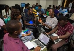 Participants at an undated Stand to End Rape event map hospitals and police stations in Nigeria’s Lagos state. (Photo courtesy of STER)