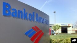 FILE - Bank of America will pay a record fine of nearly $17 billion for selling bad housing loans. Shown here is a branch in Charlotte, North Carolina.