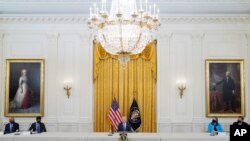 President Joe Biden speaks during a meeting about cybersecurity in the East Room of the White House, Aug. 25, 2021, in Washington. 