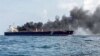 Kapal tanker berbendera Singapura Hafnia Nile terbakar di Tanjung Sedili, dekat Singapura. (Foto: AFP)