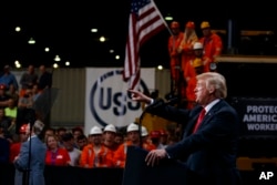 President Donald Trump speaks on trade at Granite City Works Steel Coil Warehouse, Granite City, Illinois, July 26, 2018.