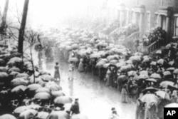 An estimated 400,000 people - one of every 10 New Yorkers - braved the driving rain to pay their respects to victims of the Triangle fire.