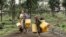 Residents carry jerrycans on their way to collect water from a water point installed by Doctors Without Borders (MSF) in Mugunga, Goma, Democratic Republic of Congo, Feb. 11, 2025. 