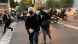 سرکوب معترضان در ایران.