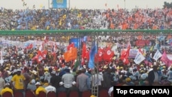 FILE - With the colors of their parties, tens of thousands of supporters gathered at the stadium Tata Raphaël to express their support for President Joseph Kabila in Kinshasa, DRC, July 29, 2016. (VOA/Top Congo)