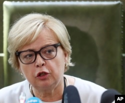 Malgorzata Gersdorf, first president of the Polish Supreme Court, speaks to reporters in Warsaw, July 4, 2018.