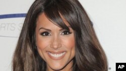 FILE - Model Leeann Tweeden attends the "Sports Spectacular" in Los Angeles, California.