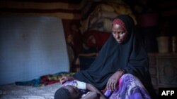 FILE — Amran Mahamood used to circumcise young girls in Hargeysa, Somalia, but stopped after a religious leader convinced her the rite was not required by Islamic law.