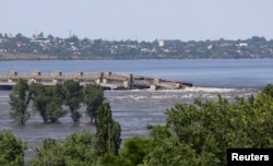 Probijena brana u Hersonu (Foto: Reuters/Alexey Konovalov/TASS/Handout)