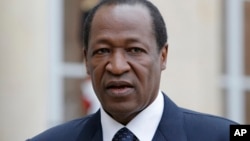 L'ancien président du Burkina Faso Blaise Compaoré à Paris avec François Hollande, le 18 septembre 2012.