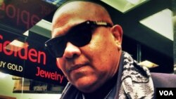 Hector Panama, a "Diamond District" bodyguard who emigrated to New York 40 years ago, feels blessed to be in the "city of his dreams." (Adam Phillips/VOA)