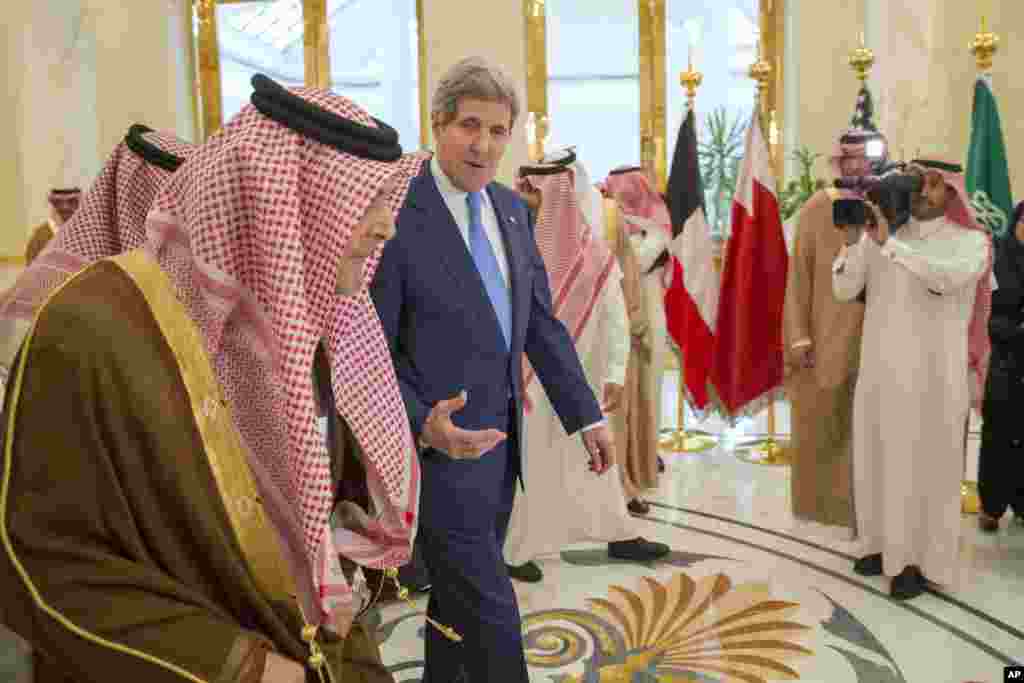 U.S. Secretary of State John Kerry speaks with Saud bin Faisal bin Abdulaziz al-Saud, Foreign Minister of Saudi Arabia, during a meeting of Gulf foreign ministers at Riyadh Air Base, March 5, 2015.