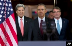 President Barack Obama, center, followed by Secretary of State John Kerry, left, and Defense Secretary Ash Carter right, walks to a podium to speak to media after a meeting of his National Security Council (NSC) at the State Department in Washington, Feb.