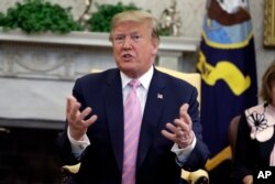 FILE - President Donald Trump speaks in the Oval Office of the White House, April 9, 2019.