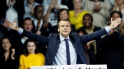 FILE - Then-candidate Emmanuel Macron attends a political rally in Paris, Dec. 10, 2016, ahead of the 2017 French presidential election.