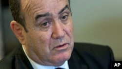 Guatemala's President-elect Alejandro Giammattei gives an interview in Guatemala City, Aug. 13, 2019.