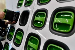 FILE - Batteries designed by Gogoro are displayed Dec. 14, 2021, at the company's headquarters in Taipei.