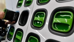 FILE - Batteries designed by Gogoro are displayed Dec. 14, 2021, at the company's headquarters in Taipei.