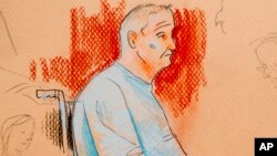 This courtroom sketch depicts Robert Gregory Bowers, who was wounded in a gun battle with police as he appeared in a wheelchair at federal court on Oct. 29, 2018, in Pittsburgh.