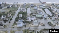 រូបឯកសារ៖ ទឹកជំនន់​ដែល​​កើតឡើង​ដោយសារ​ព្យុះ Arthur នៅ​ក្នុង​រដ្ឋ North Carolina សហរដ្ឋ​អាមេរិក ថ្ងៃទី៤ ខែកក្កដា​ ឆ្នាំ២០២១។