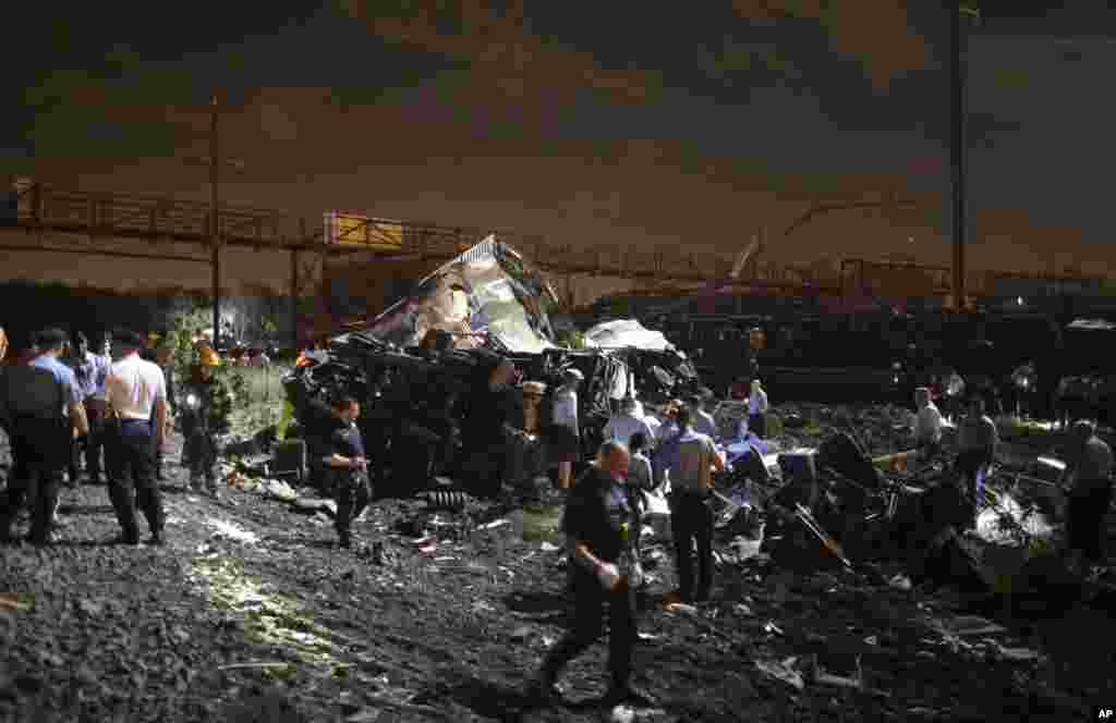 An Amtrak train headed to New York City derailed and crashed, killing at least six people. In this photo, emergency personnel work at the scene of the train wreck, in Philadelphia, May 12, 2015.